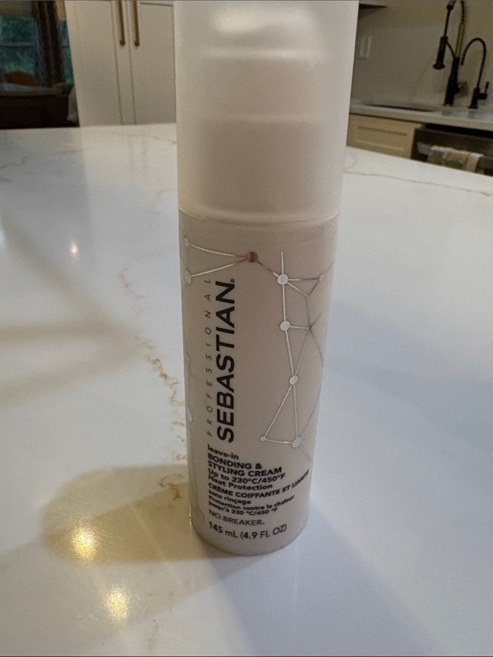 Neutral White Cylindrical Spray Bottle